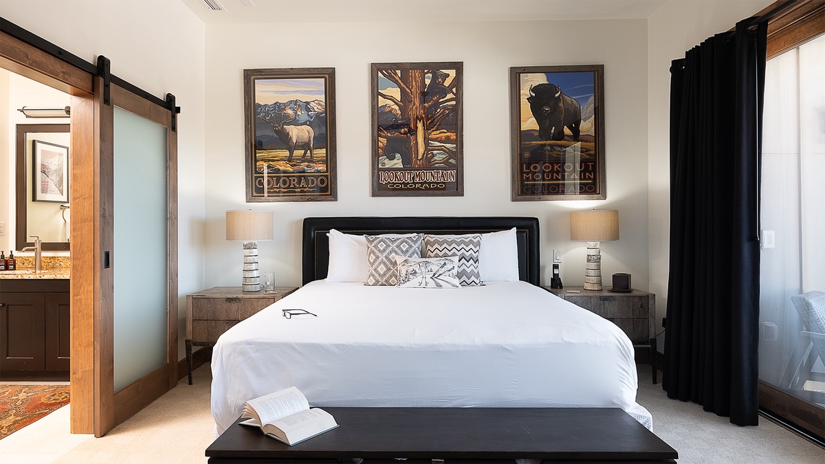 Bedroom 1, Main Level - Primary king suite with fireplace and balcony access