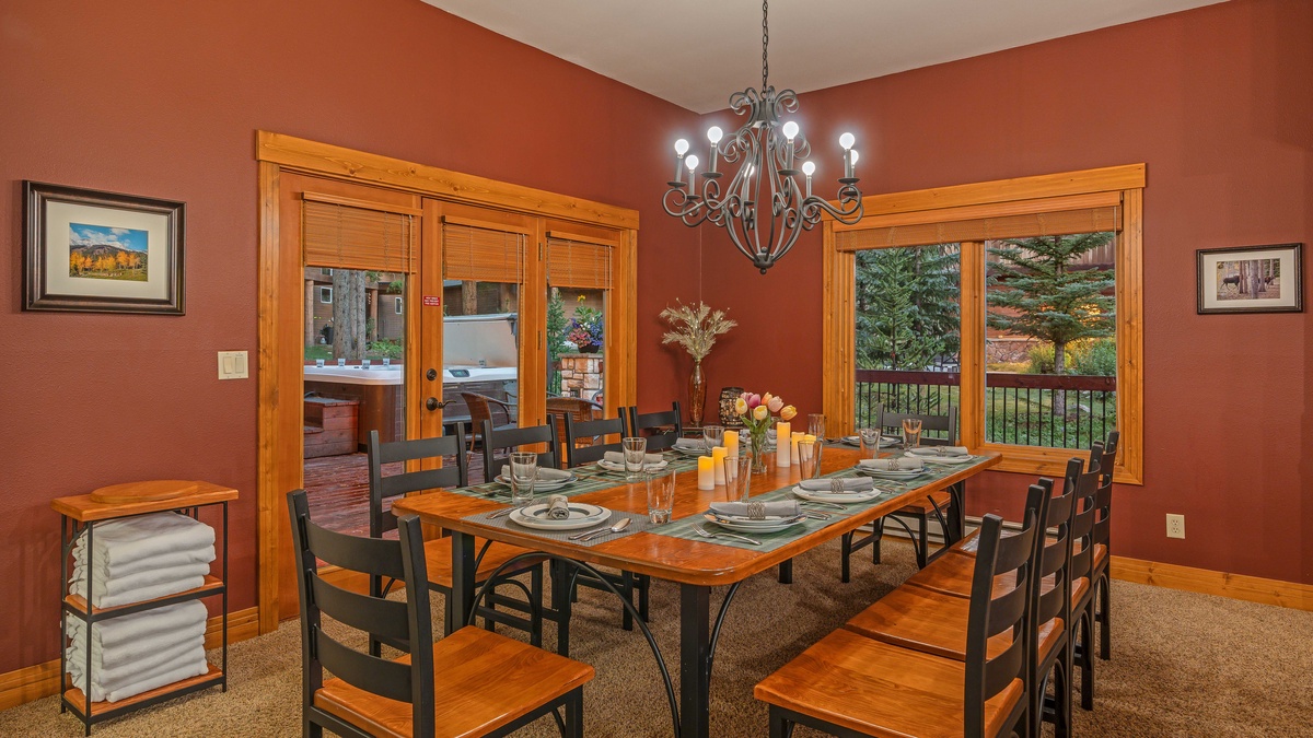 Dining area seats 10, access to deck and hot tub