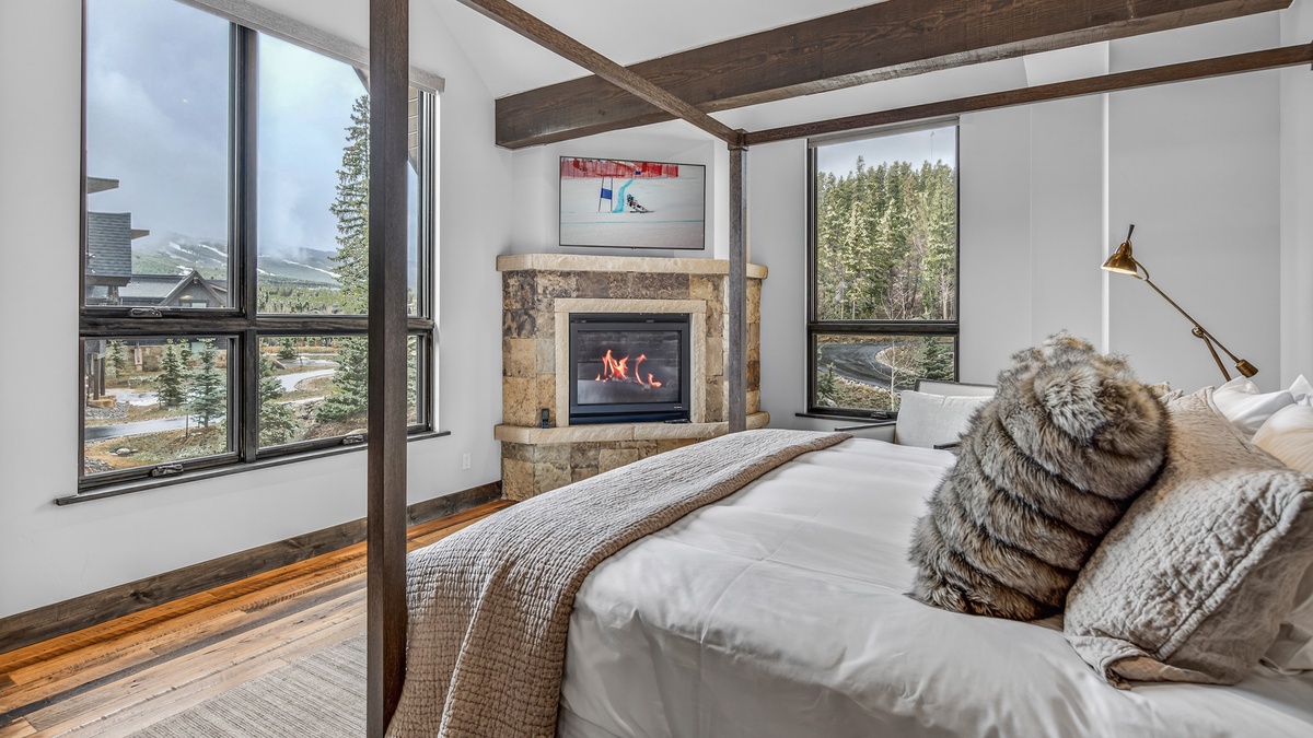 Bedroom 1, Upper Level - Primary bedroom with fireplace and mountain views