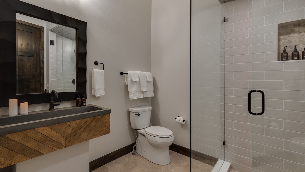 Shared full bath on main level by office