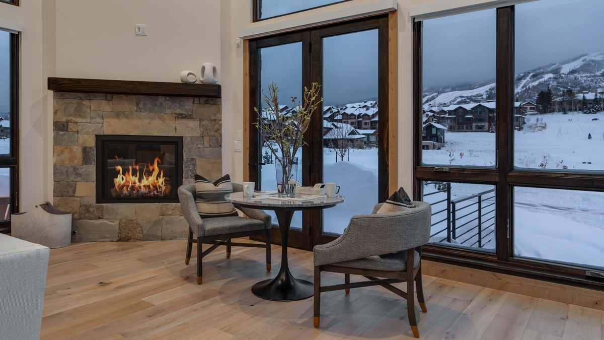 Great room with fireplace and views