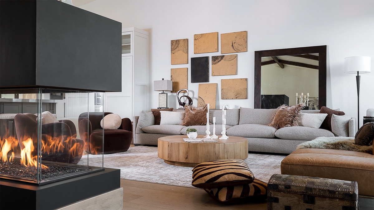 Great Room, Upper Level - Sofa seating with fireplace and wall art