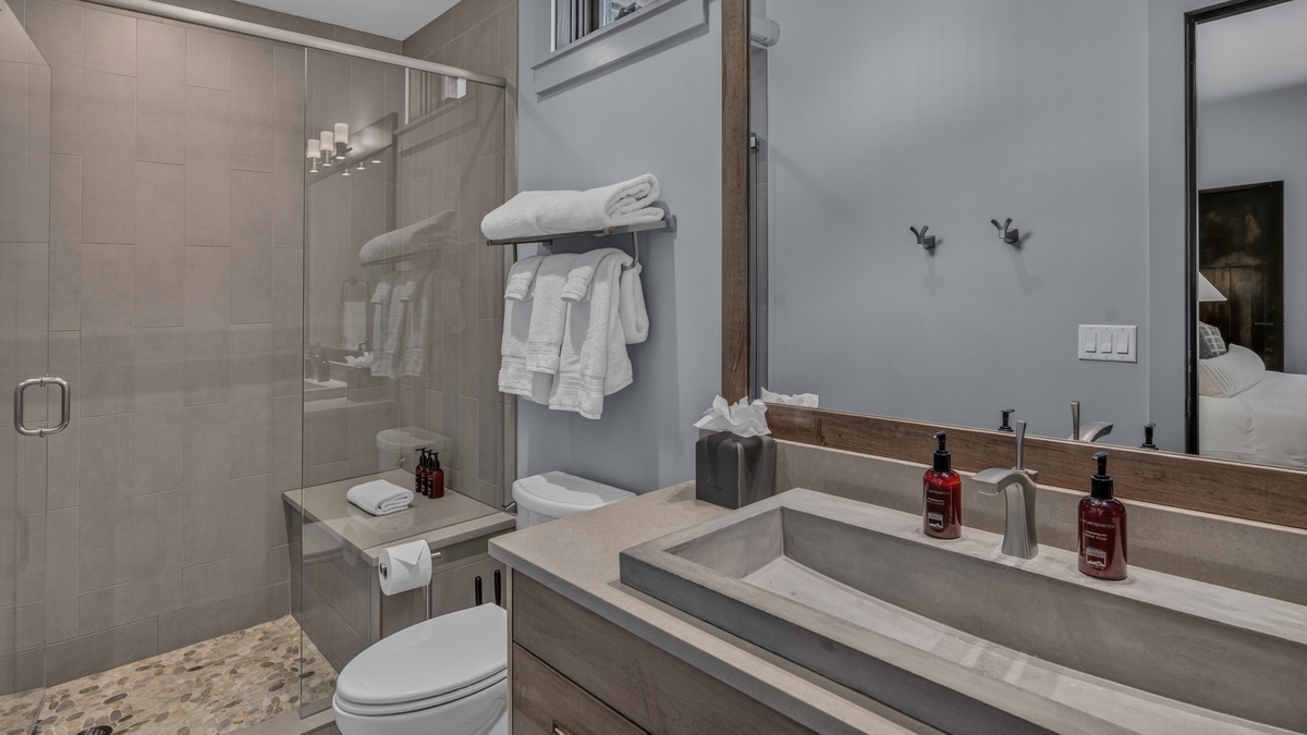 Bedroom 4, Lower Level - Ensuite with single vanity and walk-in shower