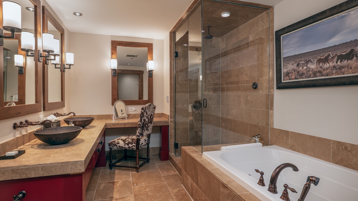 Bedroom 1, Main Level - Primary ensuite with soaking tub and walk-in shower