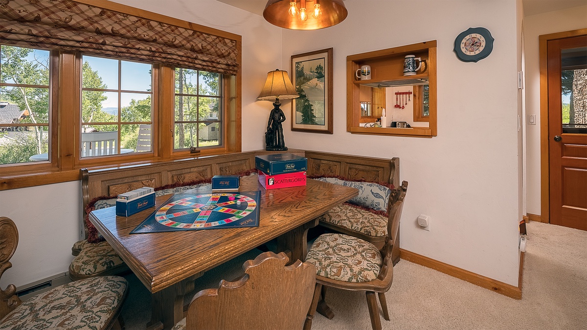 Family Room, Lower Level - Dining nook with table seating