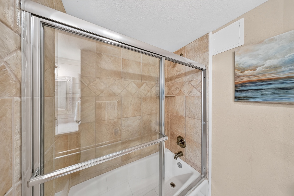 Slip into your private tub after a day of exploring, with beautiful tile work creating a spa-like atmosphere that's all yours.