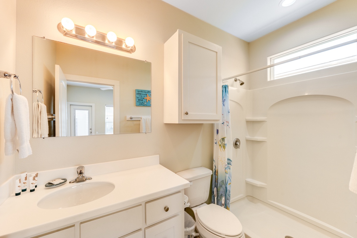 Freshen up in your bright, well-appointed bathroom with convenient vanity lighting and spacious shower-tub combo for relaxing soaks.