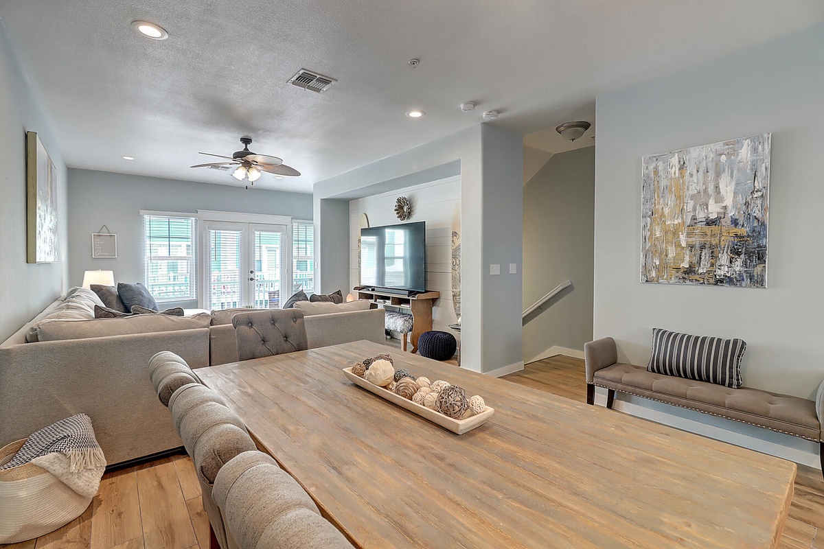 Unwind in your spacious living room with plush sectional seating, perfect for movie nights and relaxing conversations with loved ones.