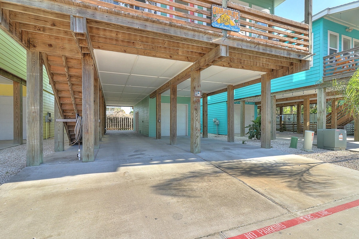 Covered parking protects your vehicle while you enjoy a beach getaway at this colorful coastal property.