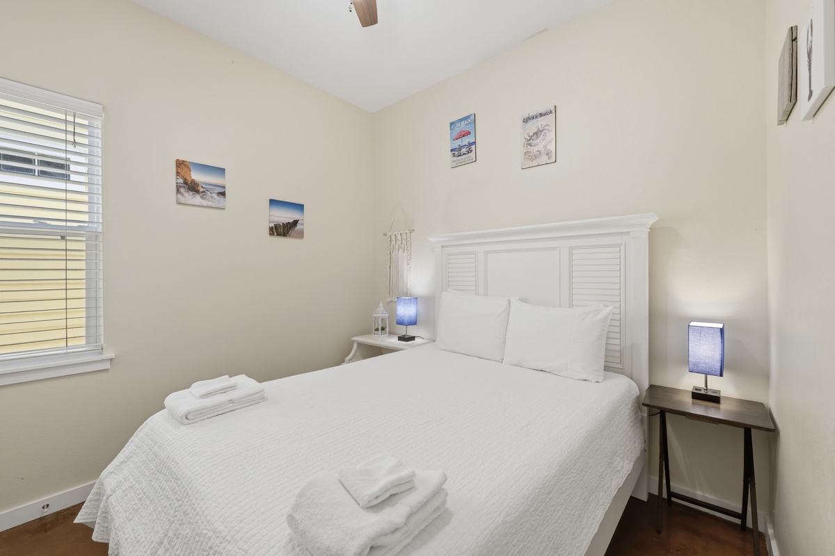 Your peaceful retreat awaits with crisp linens, coastal-inspired decor, and soft bedside lighting to help you unwind after a day of exploring.