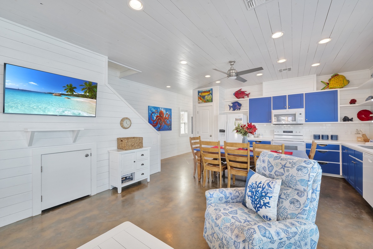 Your bright coastal haven features a fully equipped kitchen, cozy dining space, and charming ocean-themed decor that brings seaside tranquility indoors.