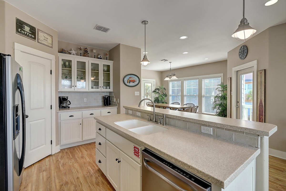 Your spacious kitchen features granite countertops, stainless appliances, and abundant storage for creating memorable vacation meals together.
