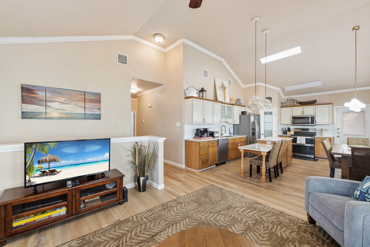 Enjoy seamless open-concept living where the comfortable lounge, dining area, and fully equipped kitchen create the perfect space to connect.