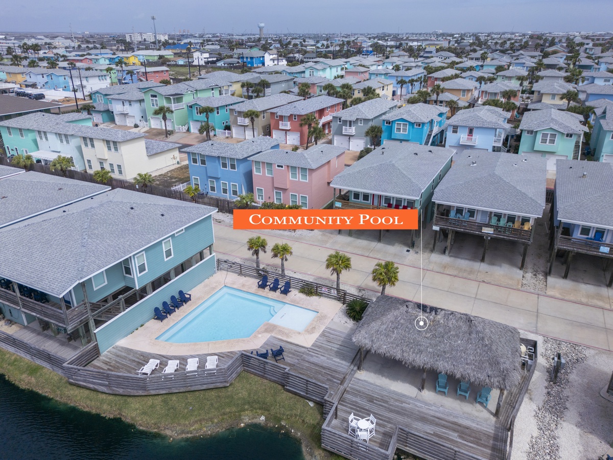 Colorful beach community with shared pool and coastal charm in a vibrant neighborhood setting.