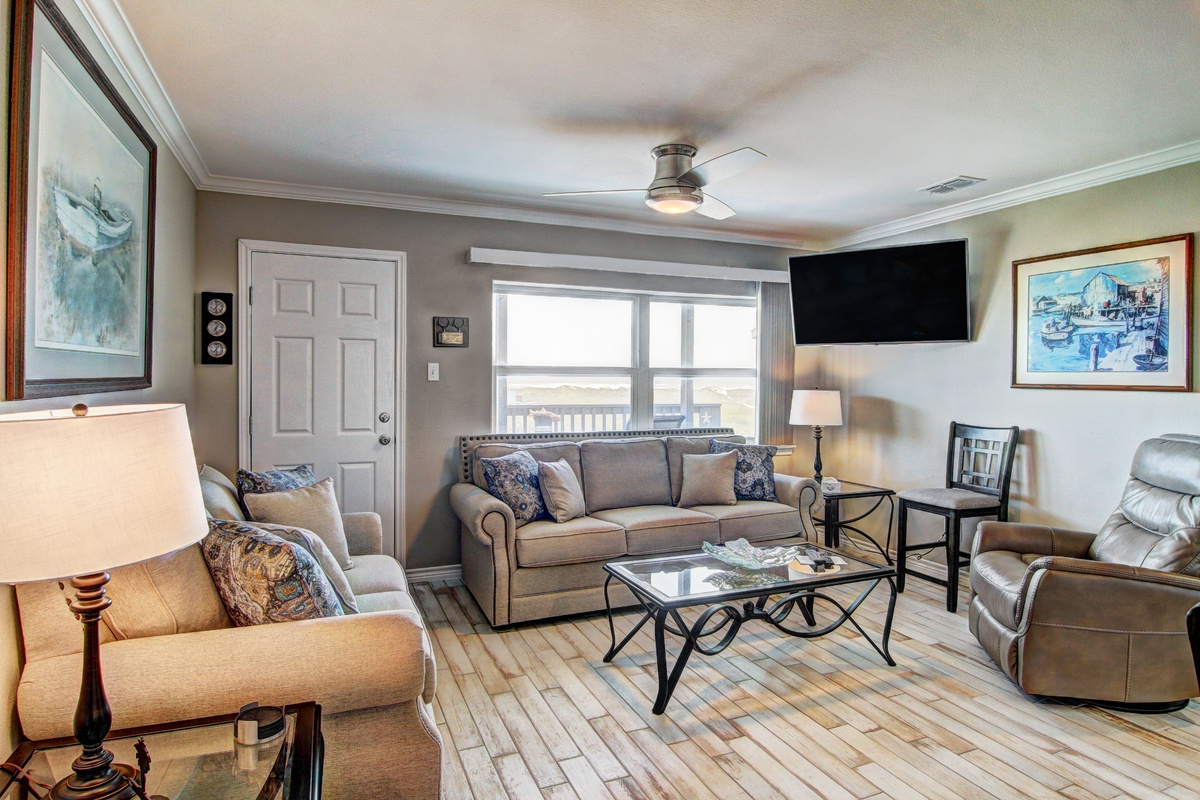 Unwind in this beautifully appointed living room where comfortable seating and thoughtful touches create your perfect home base for relaxation.