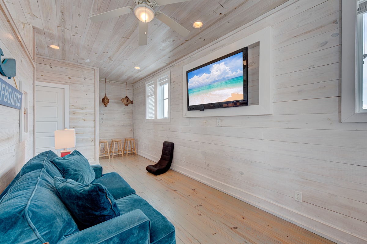 Unwind in your cozy living space with plush seating and entertainment ready for relaxing evenings after exploring.