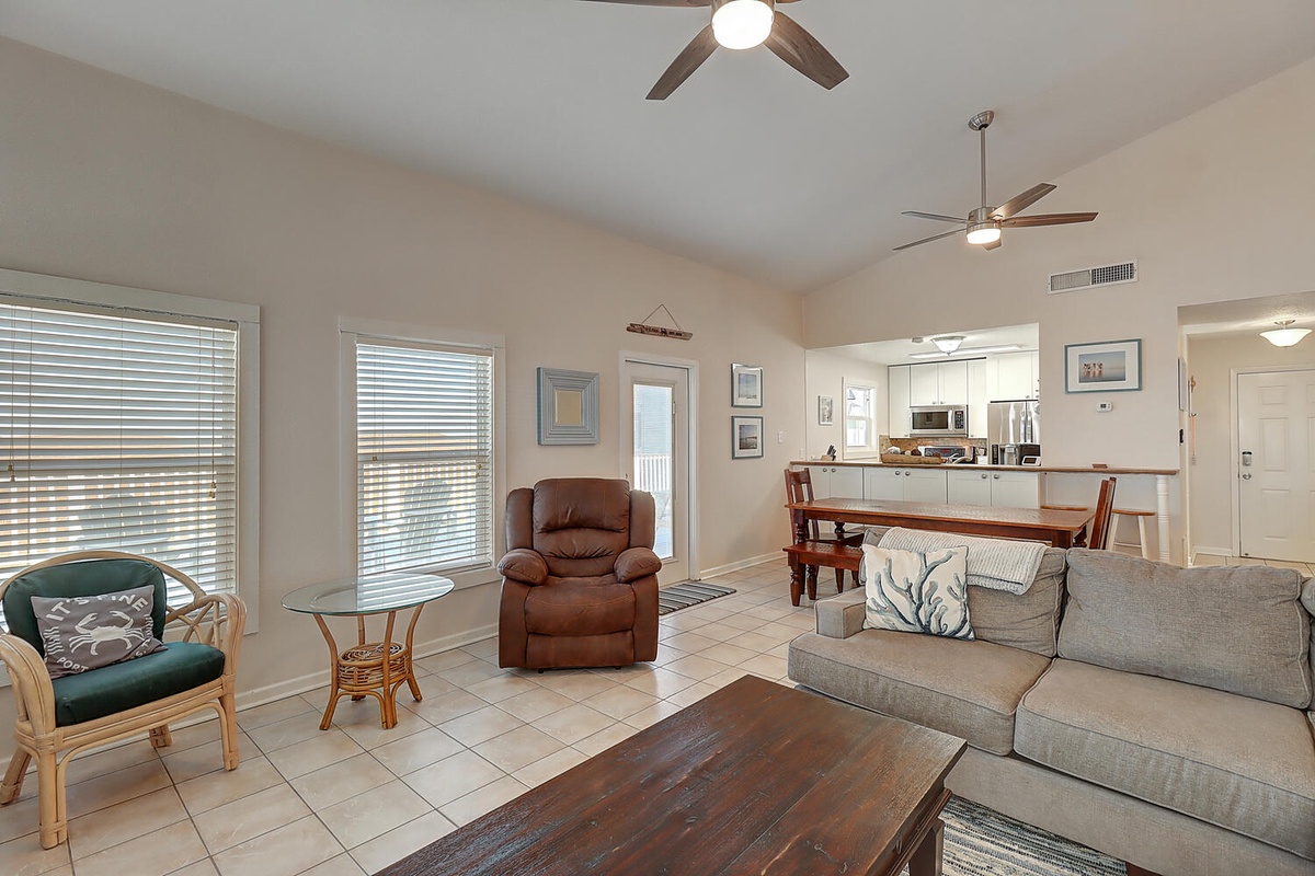 Relax in your bright, open living space with comfortable seating and modern fans keeping you cool.