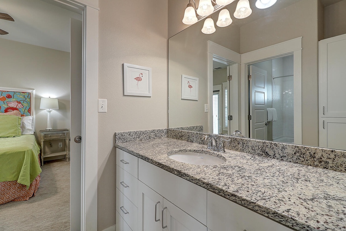 Step into your elegant ensuite with granite counters, custom vanity, and modern fixtures - your personal retreat awaits.