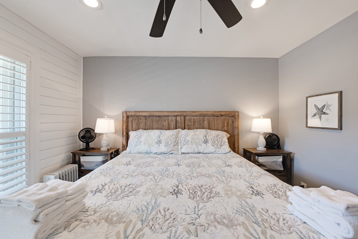 Drift off to peaceful sleep in your cozy bedroom featuring rustic charm and modern comfort with soft linens awaiting your arrival.