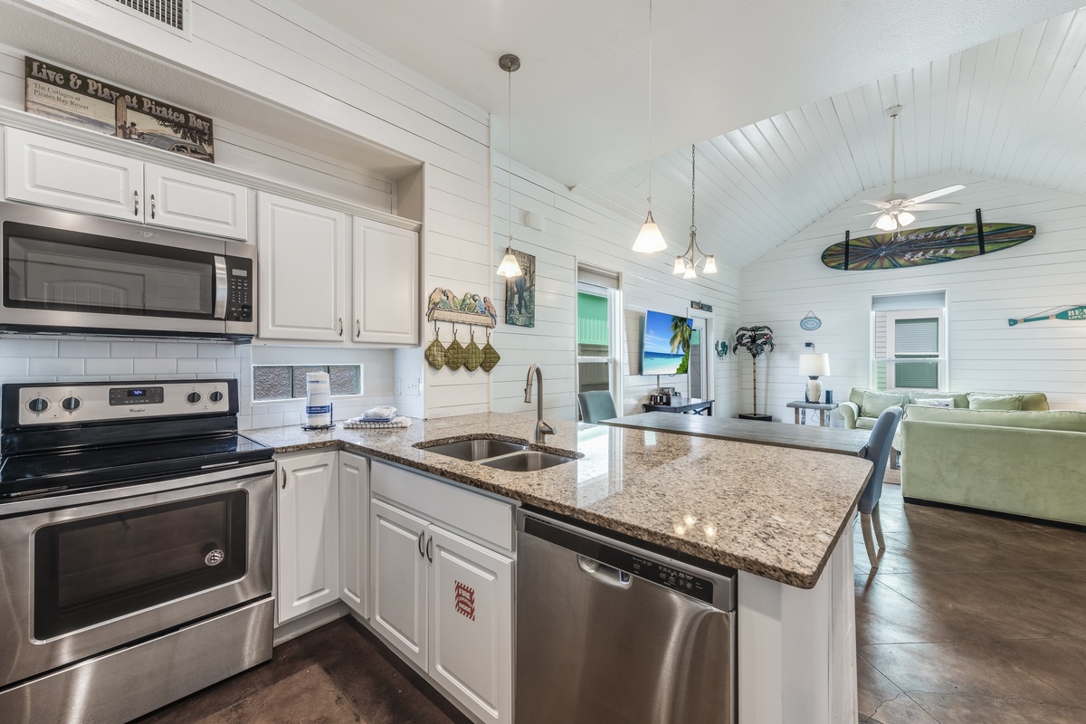 Your fully-equipped kitchen features granite countertops, stainless appliances, and an open layout perfect for preparing meals while staying connected to loved ones.