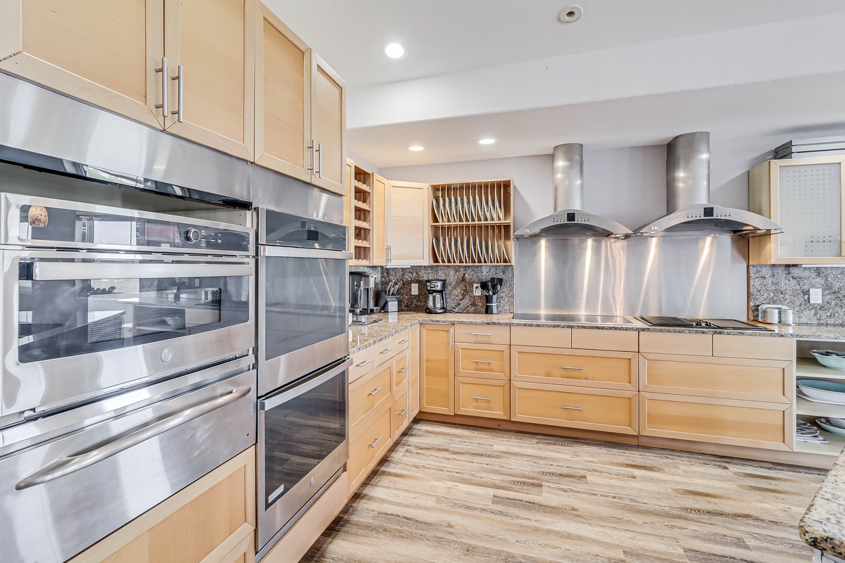 Your gourmet kitchen awaits with premium stainless steel appliances, granite counters, and custom cabinetry perfect for creating memorable meals.