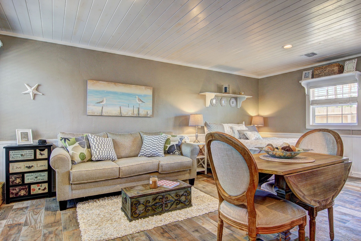 Relax in your charming coastal living room with nautical touches and cozy seating for memorable evenings together.