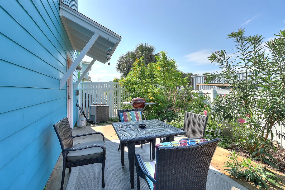 Your private patio offers the perfect spot for morning coffee or evening dinners, surrounded by tropical landscaping and endless blue skies.