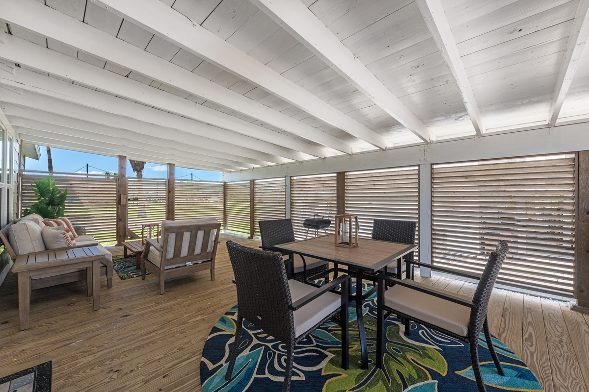 Your private covered terrace beckons with comfortable dining and lounge spaces, perfect for morning coffee or sunset cocktails in complete privacy.