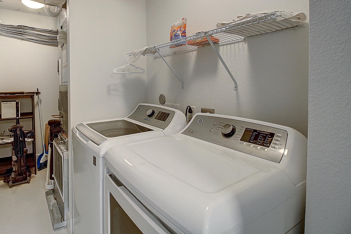 Keep your clothes fresh with your private in-unit washer and dryer, complete with convenient overhead drying racks for delicate items.