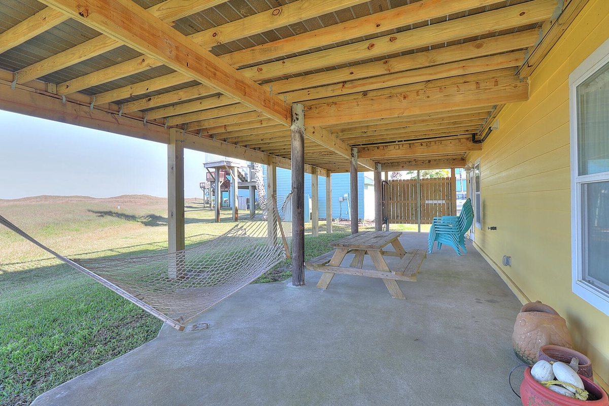 Relax on your covered patio with hammock and picnic table while enjoying views of the peaceful countryside.