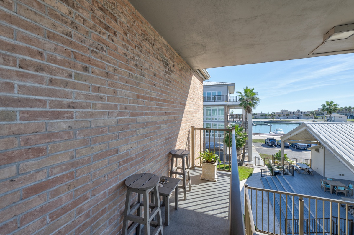 Sip your morning coffee on your private balcony while watching boats glide across the water below.