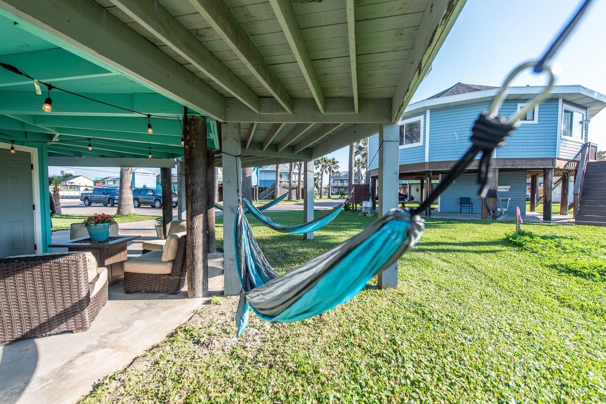 Swing gently in your hammock while sipping morning coffee on this shaded patio—pure vacation bliss awaits.