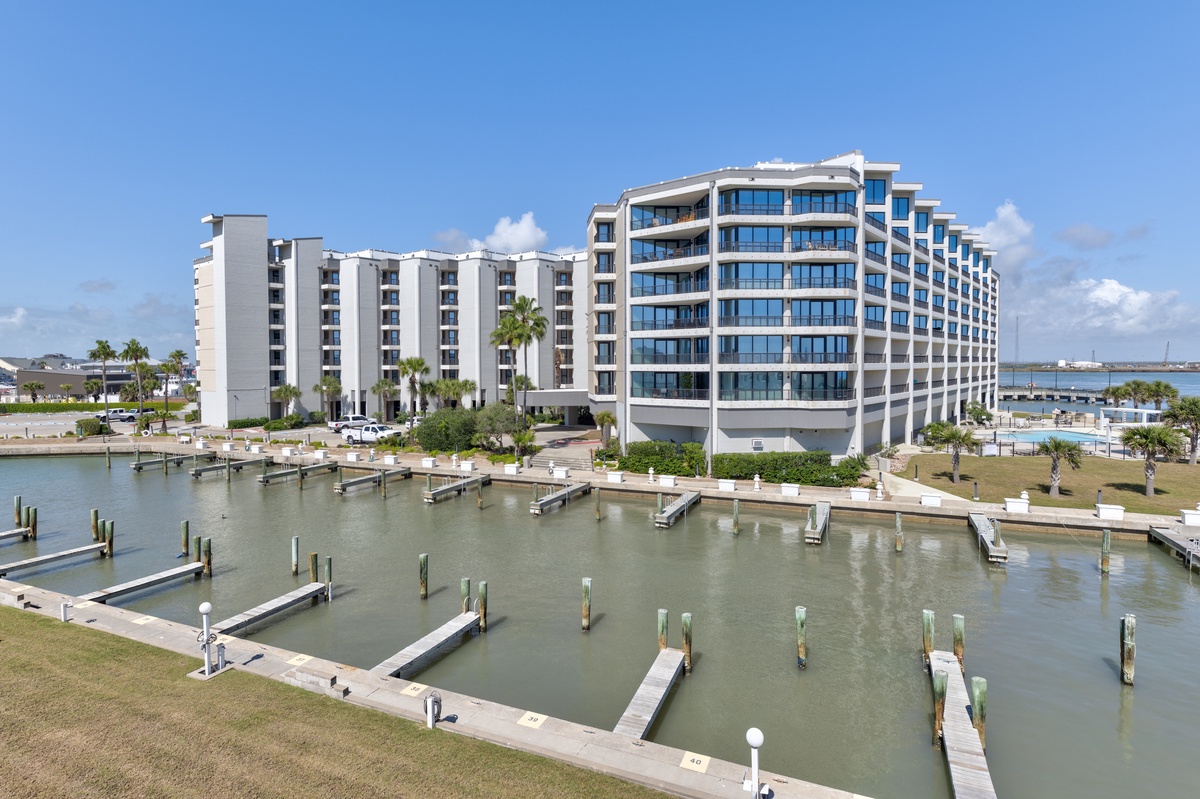 Modern waterfront property with private marina offering stunning views and premium amenities in a tranquil coastal setting.