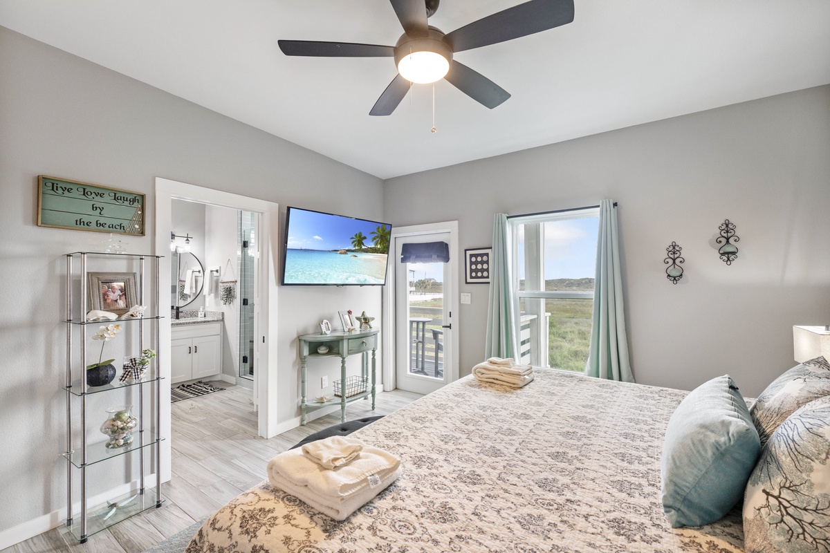Relax in your peaceful bedroom with stunning nature views and ocean-themed TV entertainment keeping you comfortable throughout your stay.