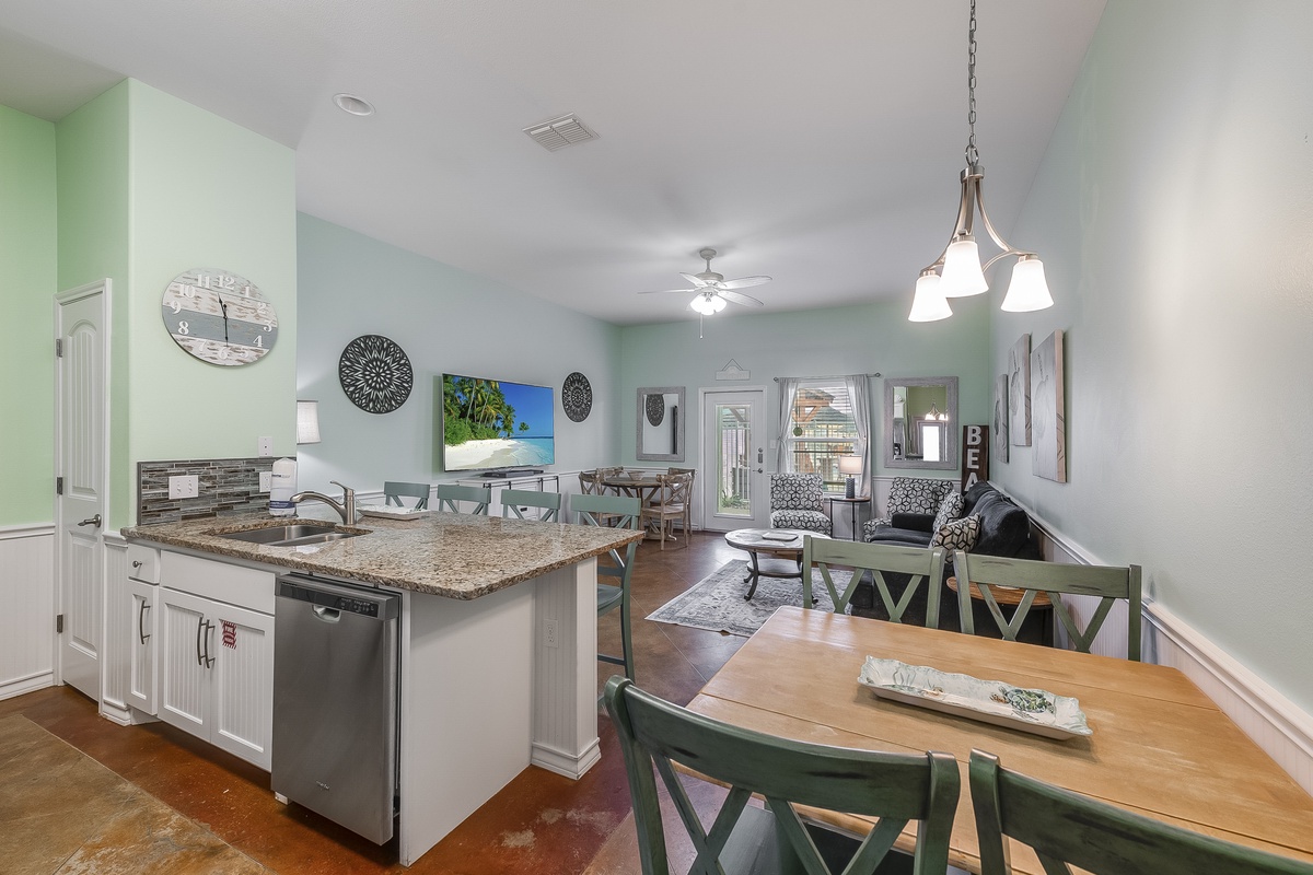Step into your bright, open-concept retreat where coastal colors and granite counters create the perfect space for your memorable meals together.