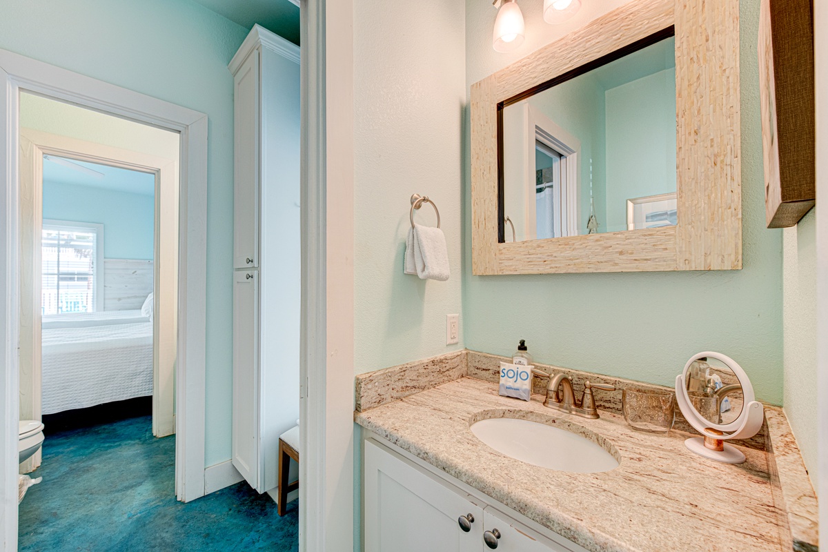 Refresh in this stylish bathroom featuring granite counters, modern fixtures, and soothing coastal colors that set the perfect tone for your stay.