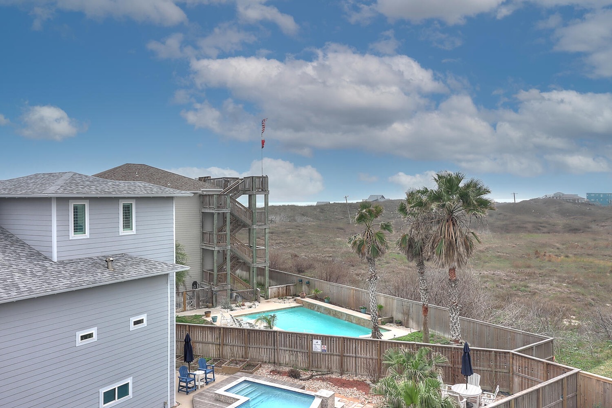 Beachside property featuring private pools and coastal views in a peaceful natural setting.