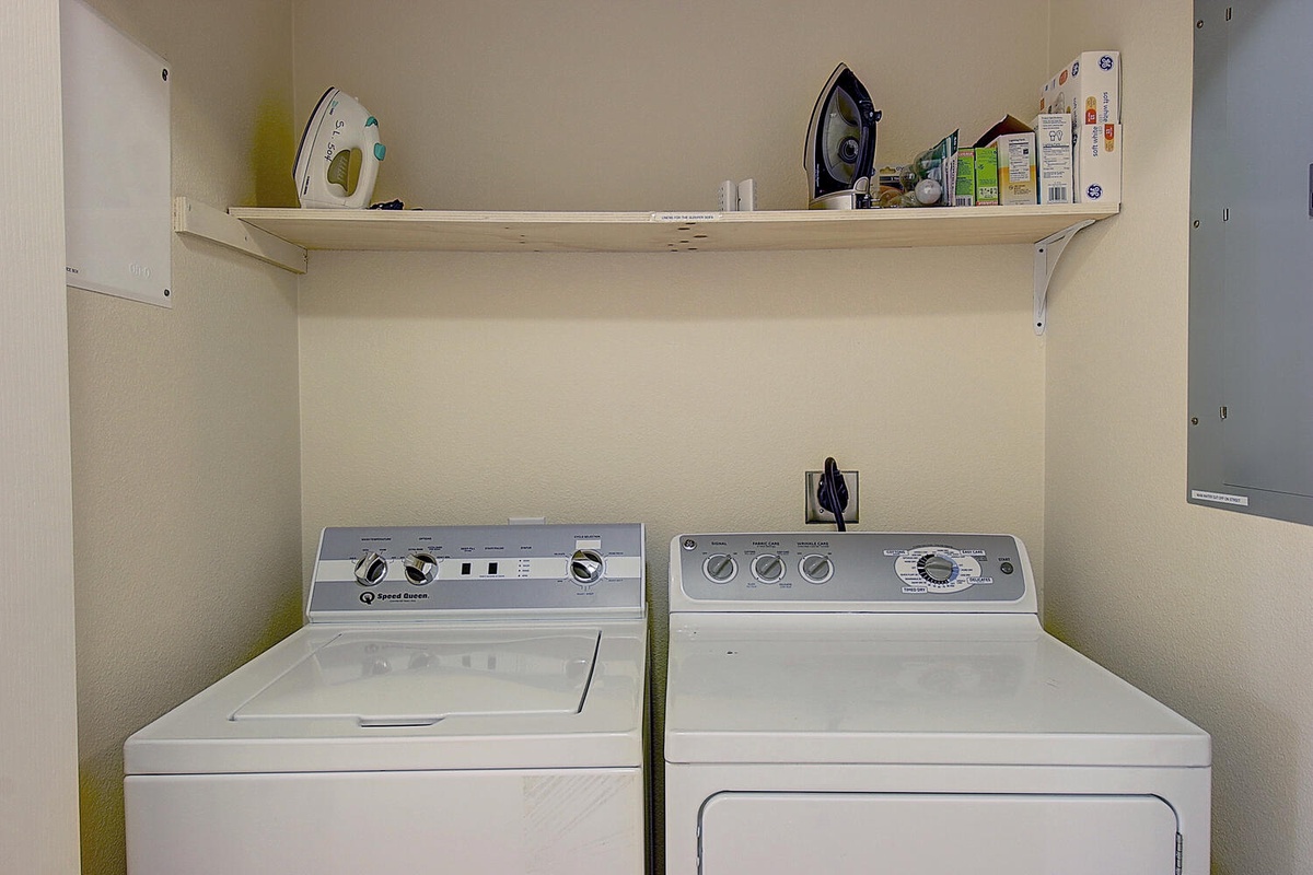 Your dedicated laundry space keeps clothes fresh with a full-size washer, dryer, and iron—perfect for longer stays.
