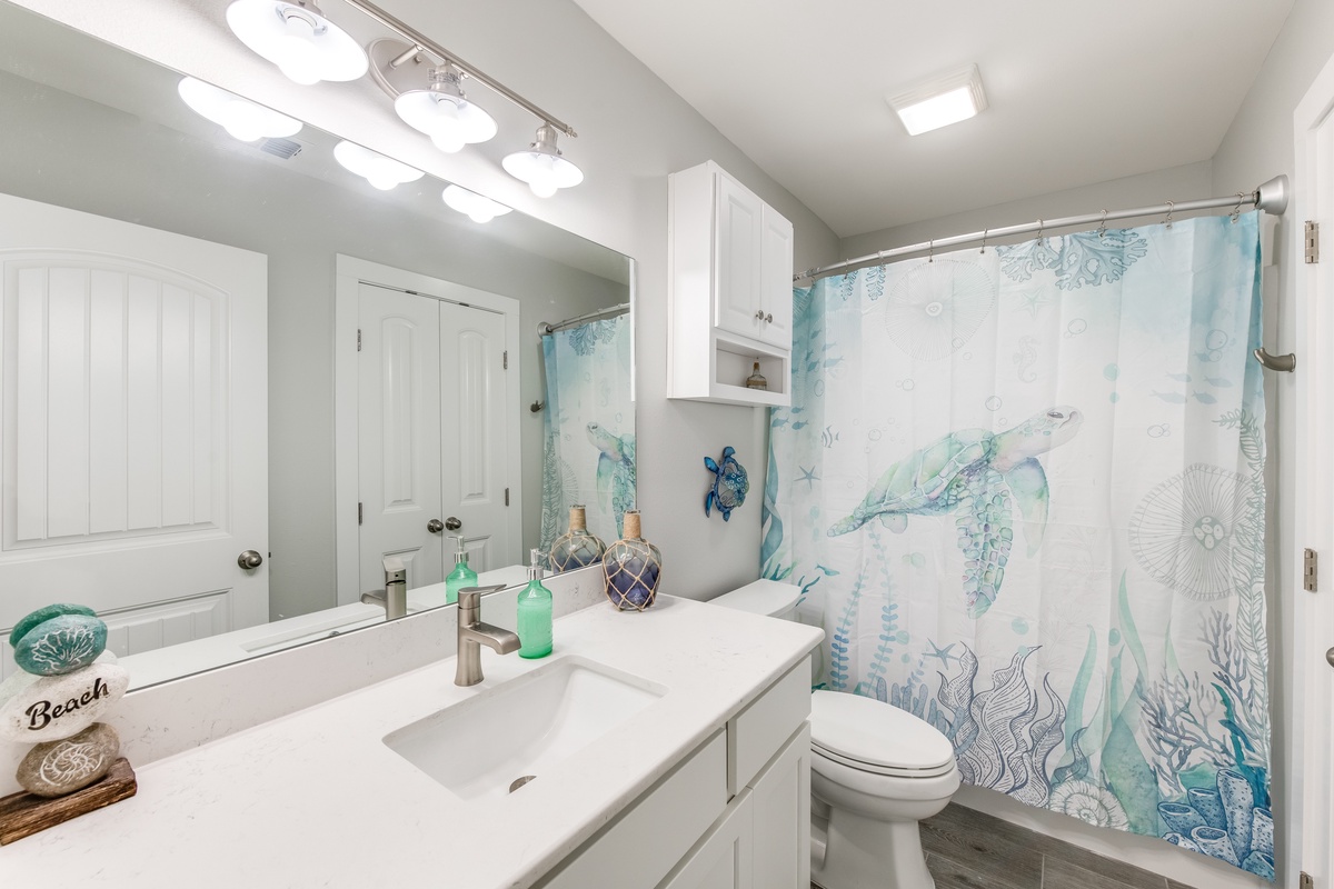 Step into your refreshing bathroom with ocean-themed touches that make every morning feel like a coastal retreat.