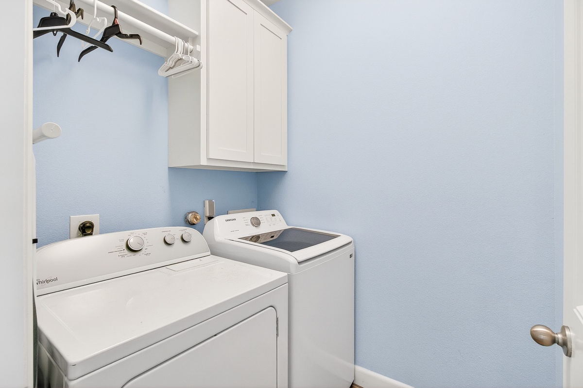 Keep your vacation wardrobe fresh in your private laundry room, complete with full-size washer and dryer plus convenient hanging space.