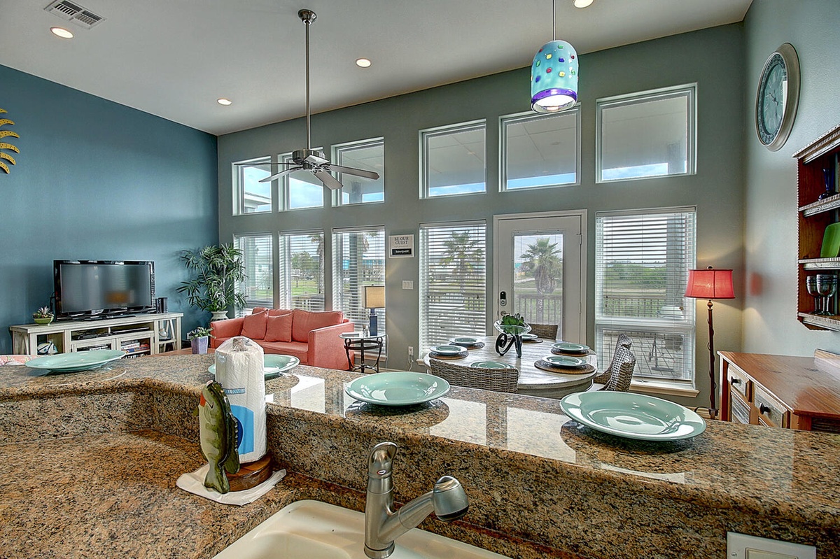 Your spacious kitchen overlooks a bright living area where you'll love gathering with family and friends.