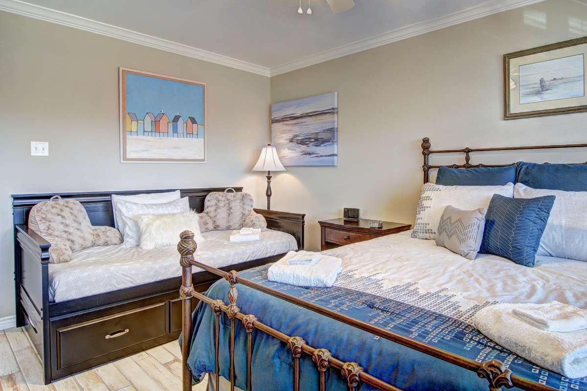Unwind in your coastal bedroom with plush bedding, charming nautical art, and thoughtful touches that make you feel instantly at home.