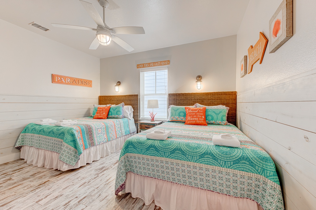 Drift off in your coastal-themed twin bedroom, where ocean-inspired bedding and beach decor create your perfect seaside retreat.