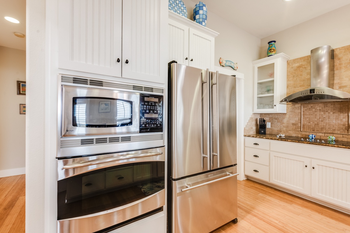 Your fully equipped kitchen features stainless steel appliances and granite countertops, perfect for preparing meals during your stay.
