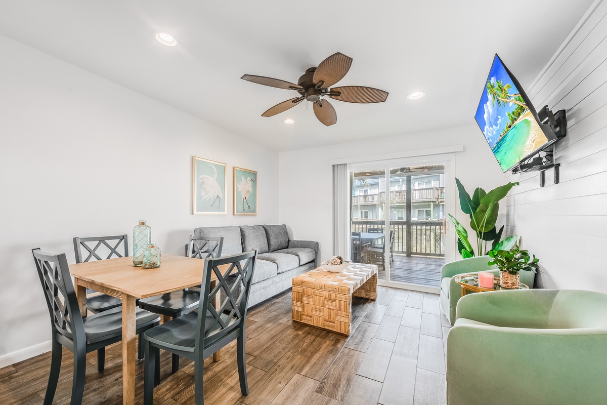 Relax in your bright, modern living space with comfortable seating, dining area, and tropical touches that make you feel instantly at home.