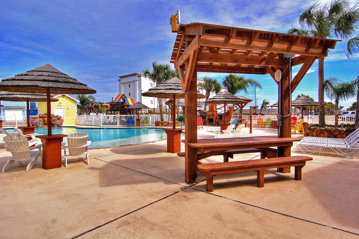 Relax at the poolside cabana with your morning coffee while kids splash in the sparkling pool nearby.