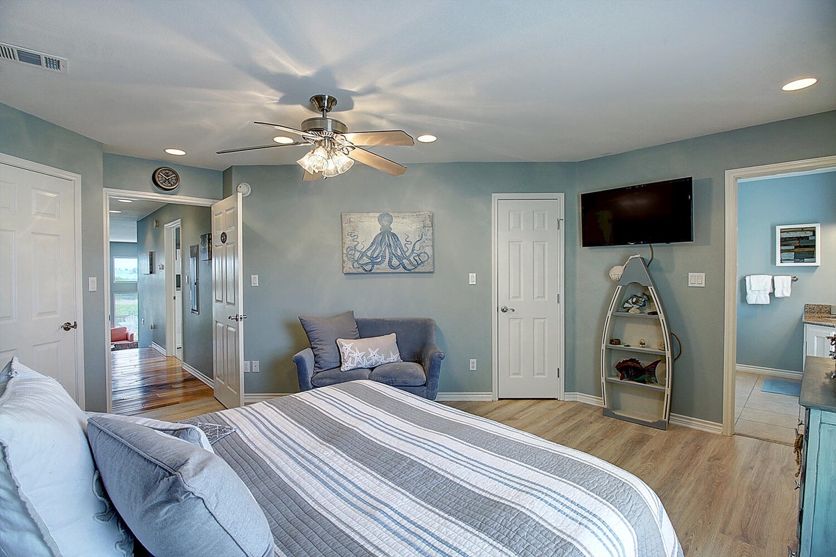 Drift off to dreamland in your coastal-themed bedroom, where ocean-inspired decor and cozy seating create your perfect seaside retreat.
