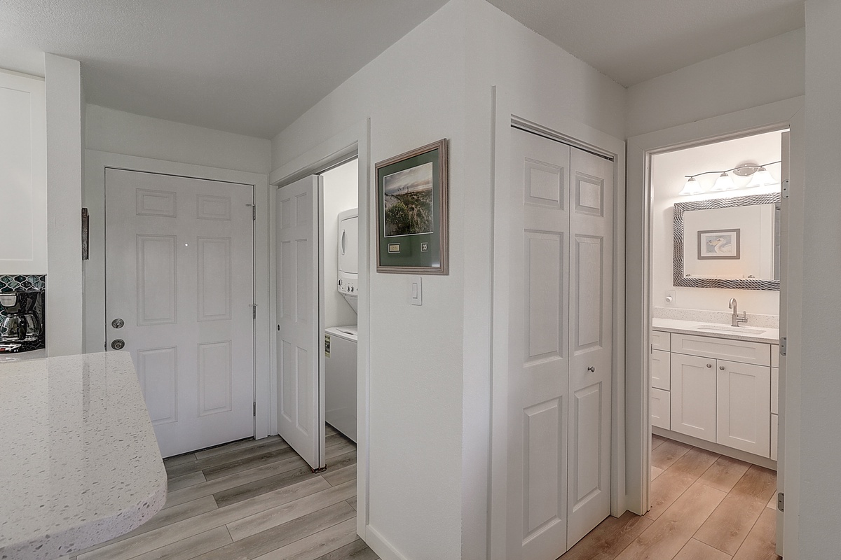 Your convenient utility area keeps everything organized with in-unit laundry, ample storage, and easy access to your bright bathroom.