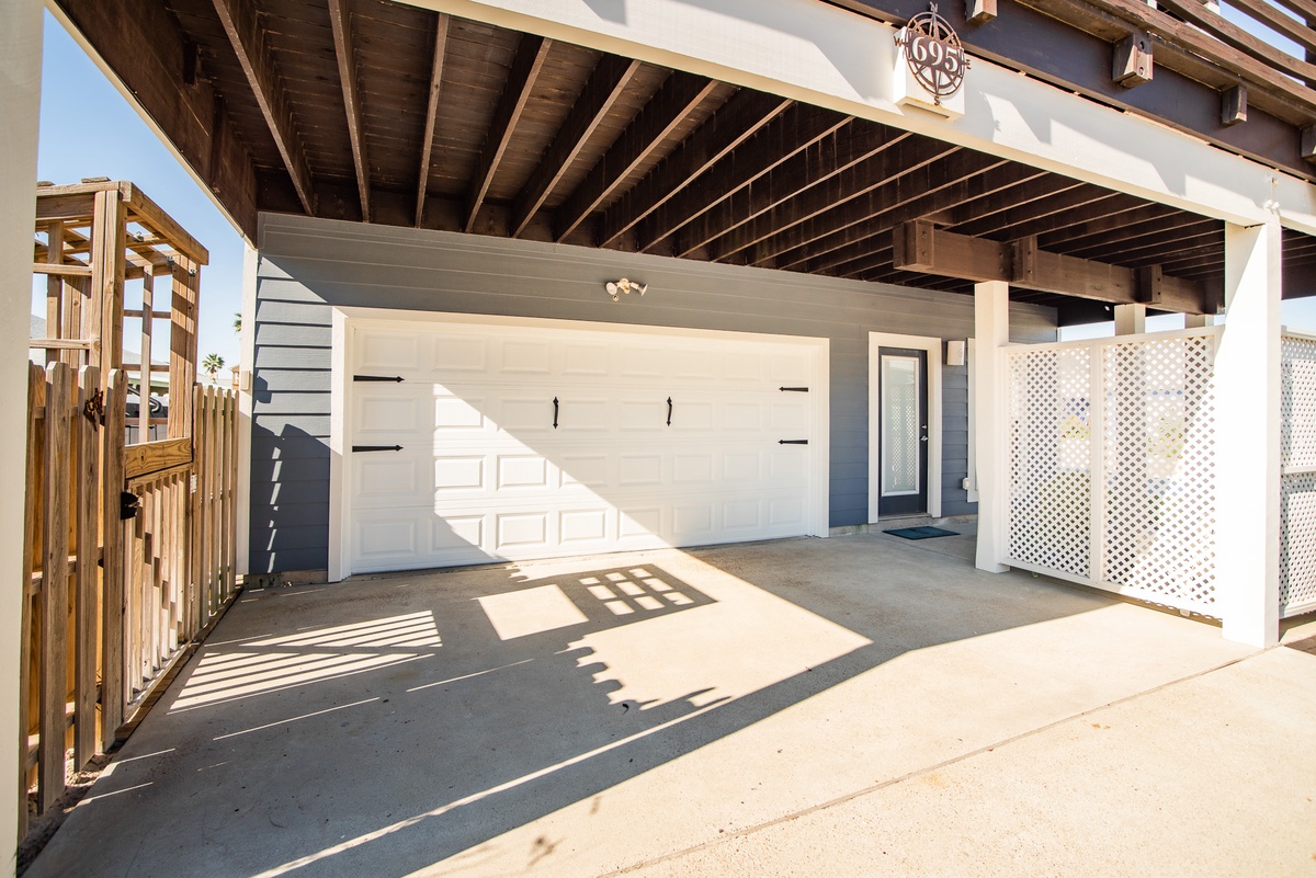 Covered parking area with storage space and private entrance to your vacation rental.