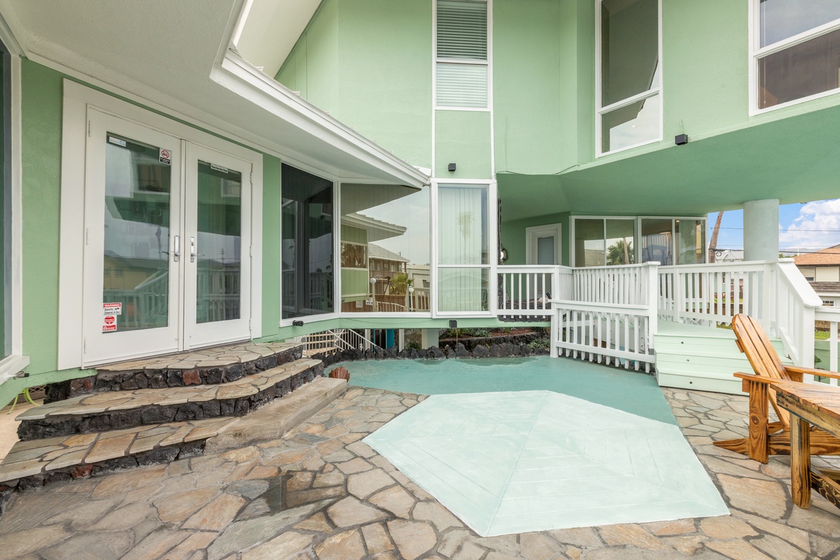 Dive into your private turquoise pool surrounded by beautiful stone patios and comfortable seating areas perfect for relaxation.